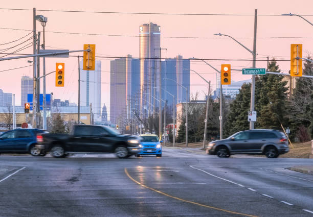 istock Detroit, Michigan - Skyline and Traffic View From Windsor 1299698983