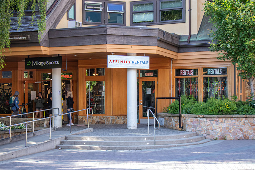 Whistler, Canada - July 5,2020: View of sign Affinity Rentals Store in Whistler Village