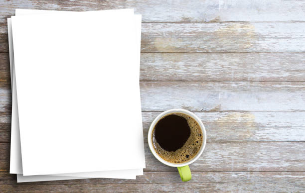 istock Hot drink and paper note - Coffee cup with white paper on brown old wood texture and background 1299707927