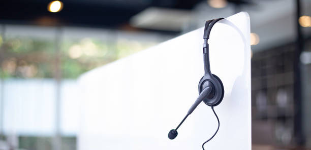 istock Communication support, call center and customer service help desk. VOIP headset for customer service support (call center) concept 1299708918