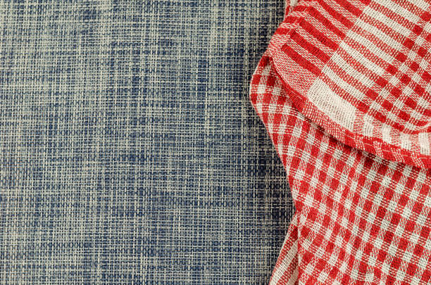 istock Red checkered blue denim cloth napkin. 1299711738