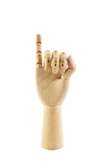 Wooden hand on a white background