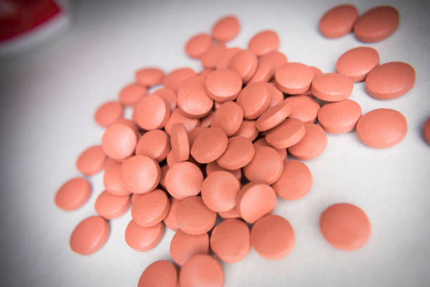 istock pile of red pills 1299717234