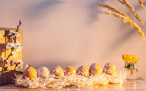 istock Easter eggs in the morning sunlight. Rural scene 1299717423