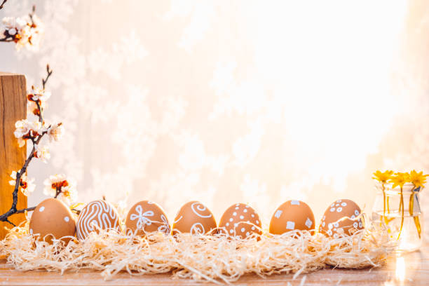 istock Easter eggs in the morning sunlight. Rural scene 1299718116
