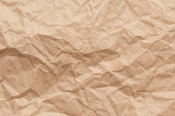 istock Recycled crumpled wrapping paper. Background and texture 1299718281