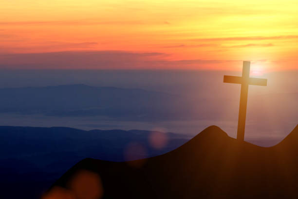 istock Jesus Christ cross on a background with dramatic sky 1299722097