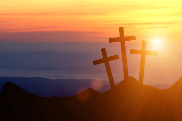 istock Jesus Christ cross on a background with dramatic sky 1299722223