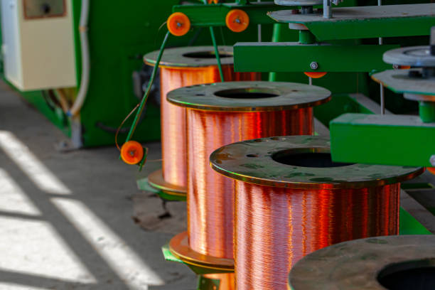 istock Copper wire reels in cable factory close up 1299723253