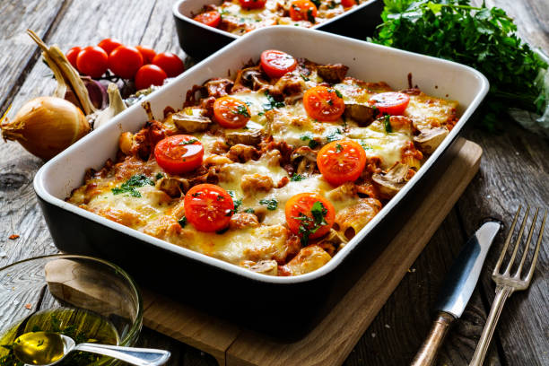 istock Pasta casserole with barbecue chicken breast, cheese and vegetables 1299724204