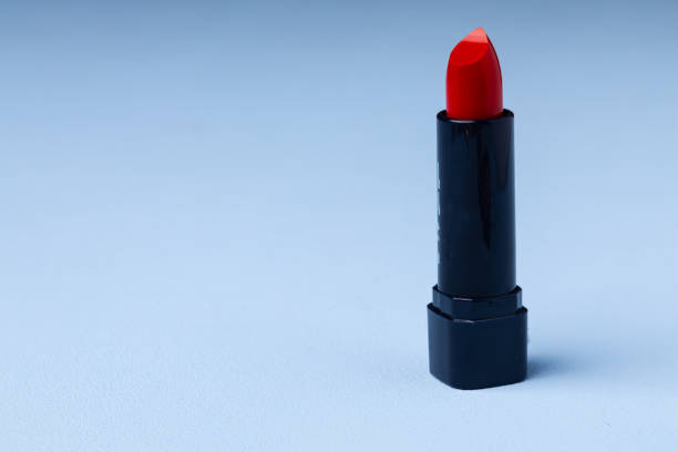 istock Lip make up product on pink background 1299724554
