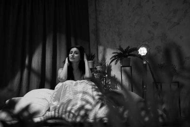 istock beautiful young woman sleeping in her bedroom 1299725651