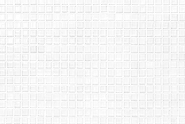 istock White or gray ceramic wall and floor tiles abstract background. Design geometric mosaic texture decoration of the bedroom. Simple seamless pattern for backdrop hospital wall, canteen and grid paper. 1299725908