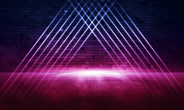 istock Rays neon light on neon brick wall. Empty scene. Neon reflections on wet asphalt. Cyberpunk background with copy space. 1299726553
