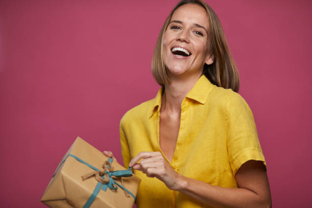 One beautiful woman holding a saint valentine's gift