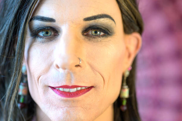istock Face portrait of a smiling transgender 1299729486