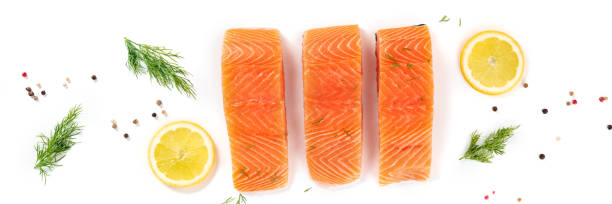 istock Salmon, overhead flat lay panorama on a white background 1299731750