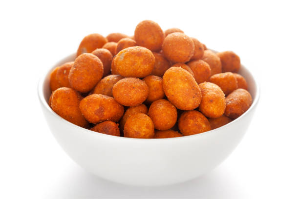 istock Crunchy Peanut in a white ceramic bowl, made with besan coated peanuts. 1299731767