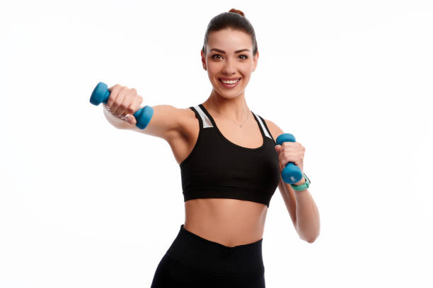 istock Attractive caucasian slim woman doing physical exercise using dumbbell isolated on white background 1299732741