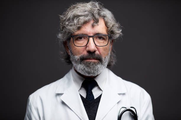 istock Senior doctor's portrait looking at the camera. 1299732993