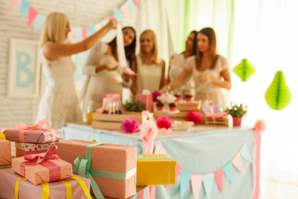 istock Presents ready to be opened during a baby shower 1299733160