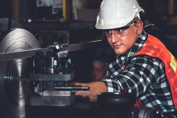 istock Smart factory worker or engineer do machine job in a manufacturing workshop 1299733221