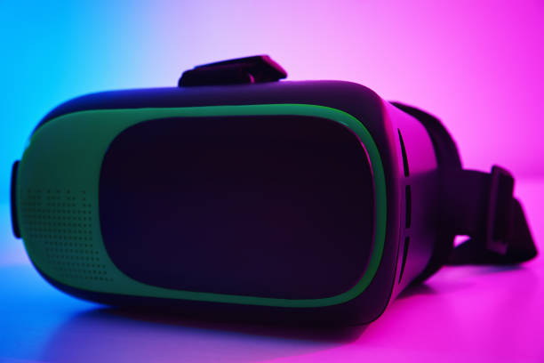 istock Virtual reality glasses on colorful background. Future technology, VR concept 1299735257