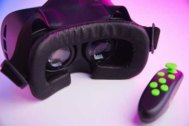 istock Virtual reality glasses on color background. Future technology, VR concept 1299735259