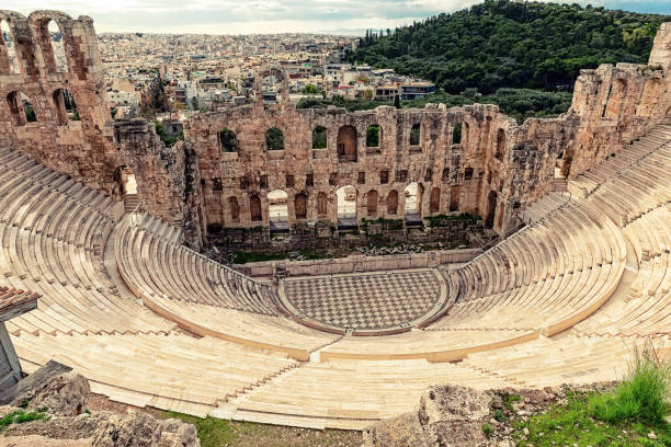 ntique open air theatre in Acropolis, Greece. The Odeon of Herodes Atticus (also called Herodeion or Herodion) is a stone Roman theater located on the Acropolis of Athens, Greece. Antique open air theatre in Acropolis, Greece. athens greece photos stock pictures, royalty-free photos & images