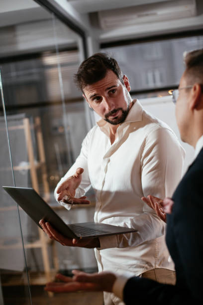 istock Colleagues in conference room making a business plan. 1299736998