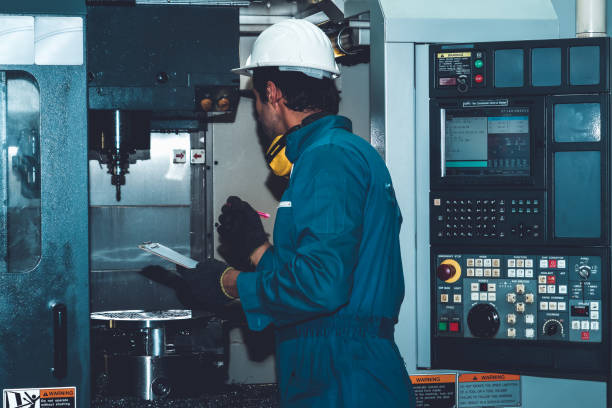 istock Smart factory worker or engineer do machine job in manufacturing workshop 1299737118
