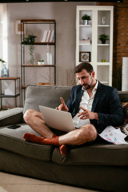 istock Businessman working at home. 1299738018