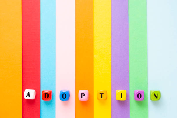 adoption word colorful striped background rainbow. - single word love wood typescript imagens e fotografias de stock