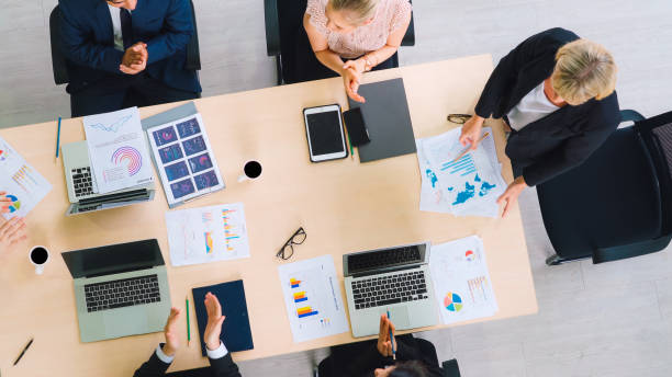 istock Business people group meeting shot from top view 1299742974