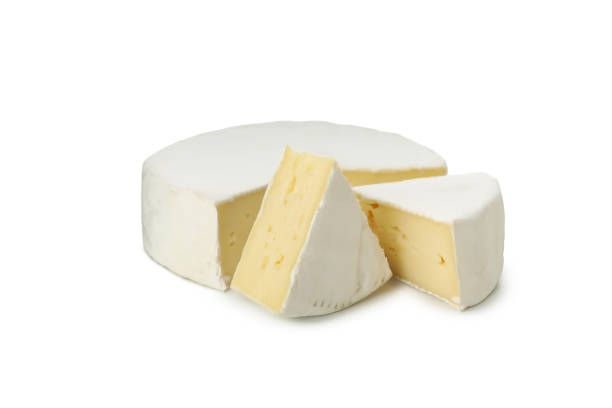 istock Delicious camembert cheese isolated on white background 1299745951