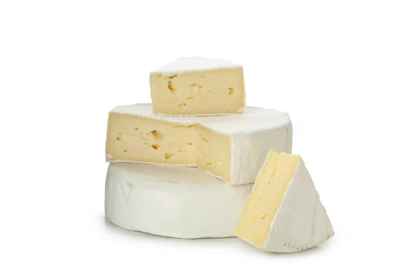 istock Delicious camembert cheese isolated on white background 1299746484
