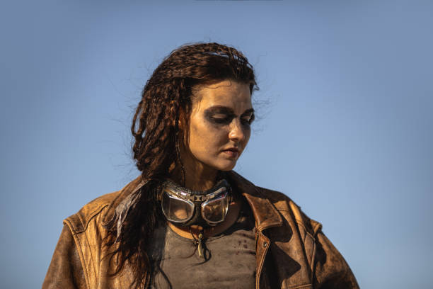 istock Post-apocalyptic Woman Outdoors in a Wasteland 1299747862