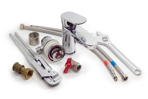 istock Plumber wrench, adjustable wrench, mixer tap and various plumbing components 1299749128