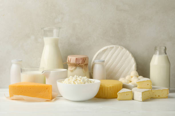 istock Different fresh dairy products on white wooden table 1299749515