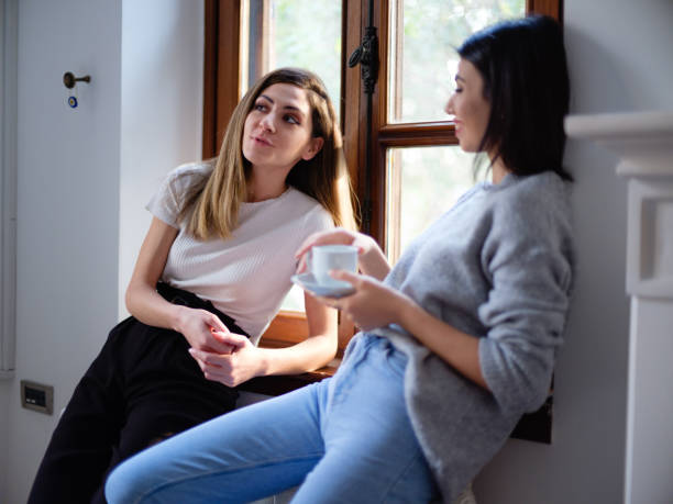 istock Two Young Woman Entrepreneurs Sharing Their Thoughts In Office 1299750423