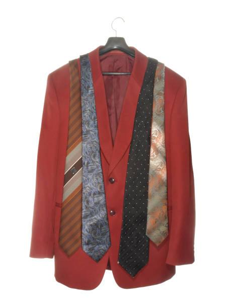 istock Burgundy jacket with various ties on a black plastic hanger with a metal hook isolated on a white background. 1299754629