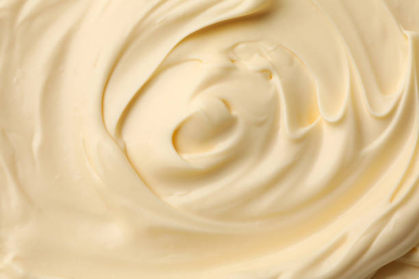 texture de sauce de mayonnaise sur le fond entier, fermez-vous vers le haut - mayonnaise photos et images de collection