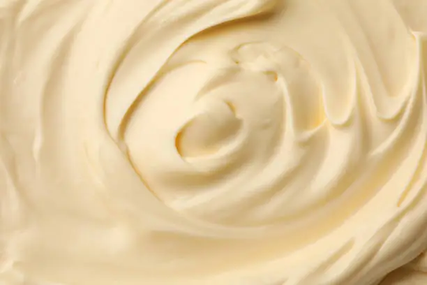 Mayonnaise sauce texture on whole background, close up