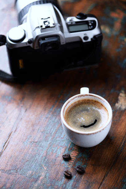 istock Cup of coffee on rustic wooden background. Close up. 1299759701