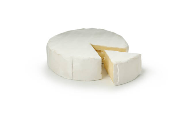 istock Delicious camembert cheese isolated on white background 1299759842