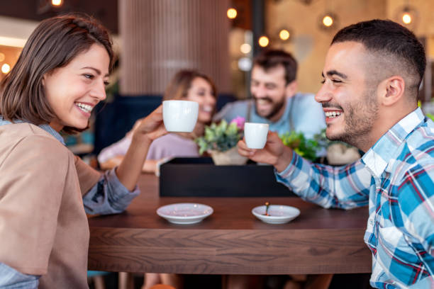istock Attractive couple in cafe 1299762439