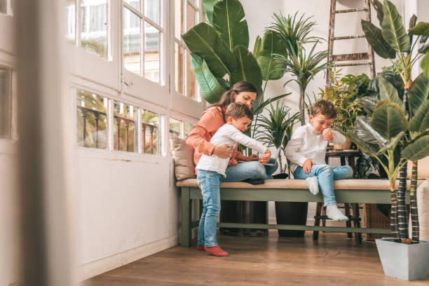istock Mother trying to work from home 1299762450