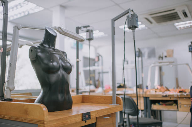 istock black mannequin display  on table in jewellery design workshop 1299764964