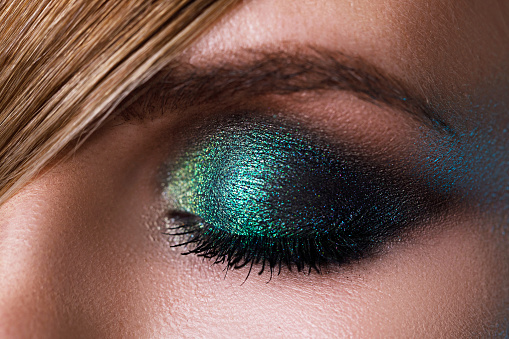 Woman eye with make up, close up.