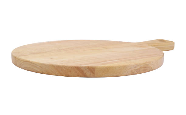 istock Wooden cutting board isolated on white 1299766099